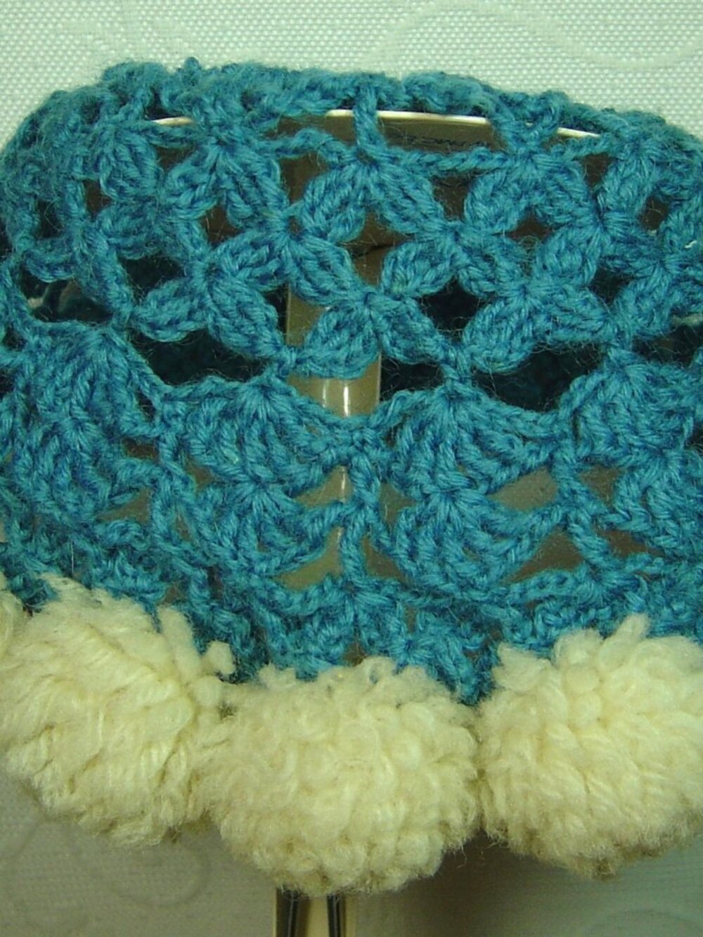 Vintage handmade blue crocheted baby/toddler hat/cap with pompom trim